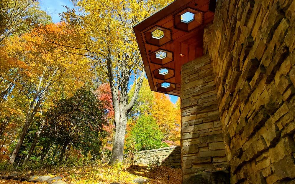 Frank Lloyd Wright’s Usonian Style, exemplified at Kentuck Knob, features native materials, flat roofs and large cantilevered overhangs.